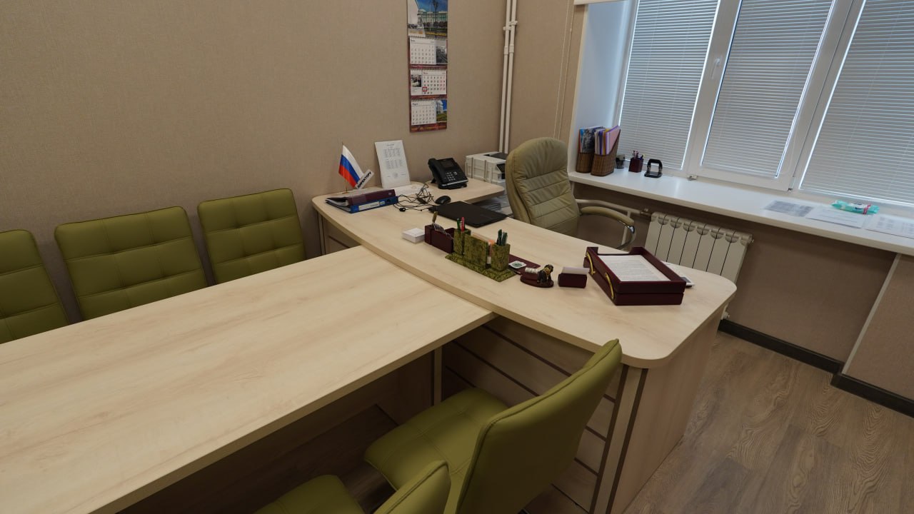 Кабинет директора — стол, зелёные кресла, флаг РФ